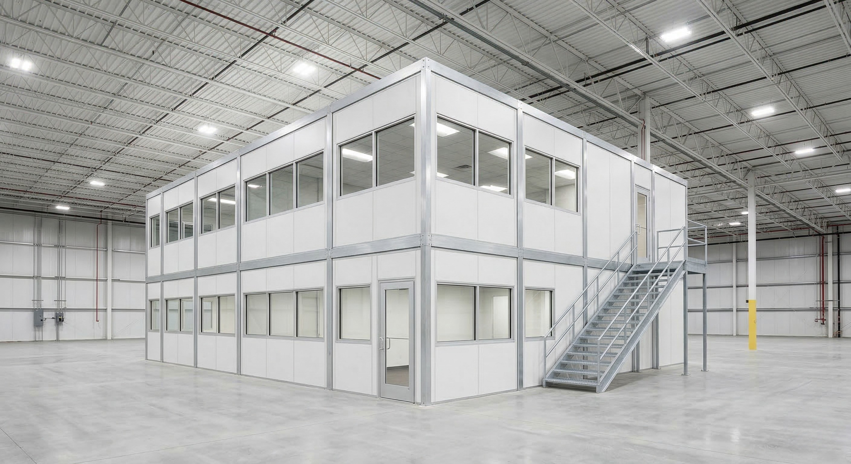 Two-story in-plant modular office with staircase installed inside a Indianapolis area warehouse